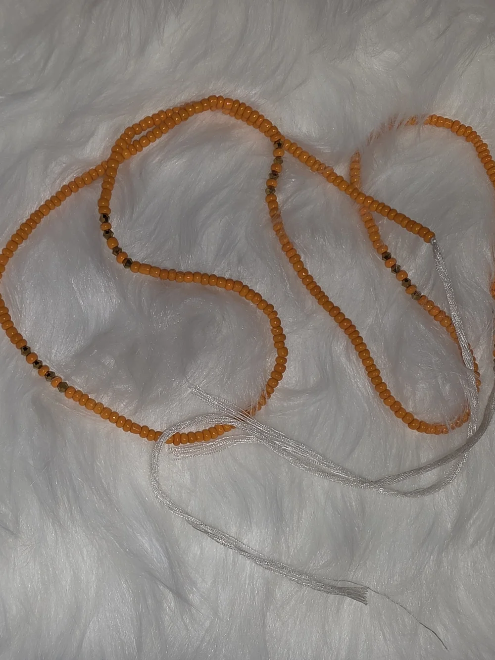 Handcrafted Orange Beaded Hair Wrap with Tassel Accent